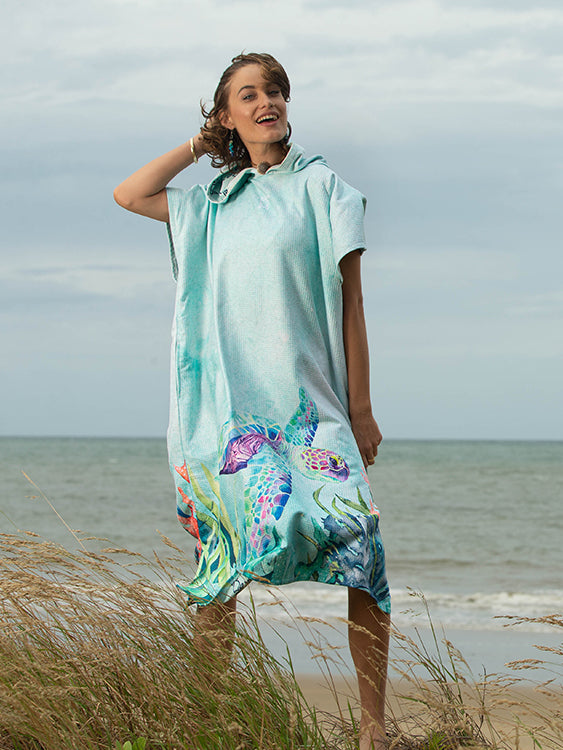 Ocean Armour Turtle Poncho Female Smiling Standing