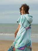 Ocean Armour Turtle Poncho Female Smiling